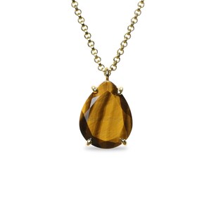May include: A gold chain necklace with a teardrop-shaped tiger's eye gemstone pendant.
