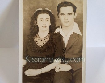 Lovely couple photo printed on postcard, showcasing their jewelry and fashion--Vintage B&W photo