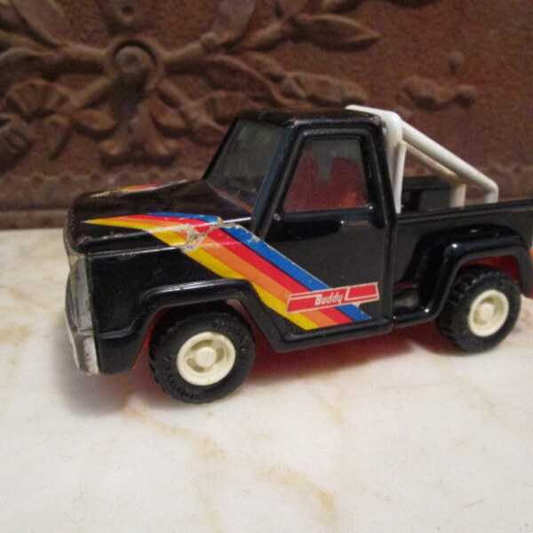 Vintage 1980s, black and rainbow,'Buddy L' stepside with rollbar!