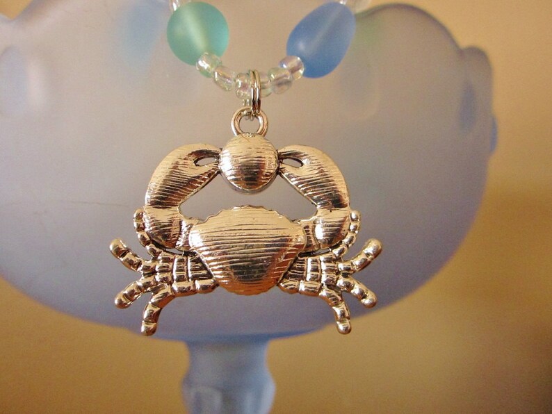 Glass Bead Necklace with Sparkle Crab holding a Pearl Etsy