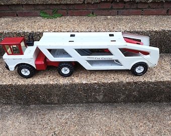 Vintage 1970-tals "Mighty Tonka" vit och röd biltransportör