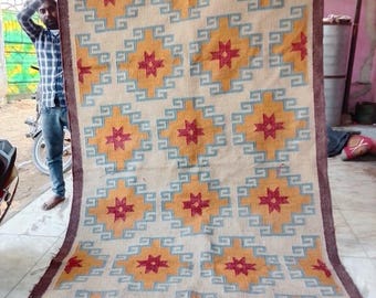 Alfombra Kilim de yute y lana tejida a mano, diseño geométrico