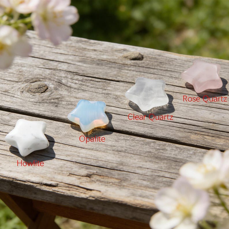May include: A collection of star-shaped gemstones, including Howlite, Opalite, Clear Quartz, and Rose Quartz, are displayed on a weathered wooden surface. The gemstones vary in color from white to translucent, with the Opalite exhibiting a blue-white iridescence. The names of the stones are labeled.