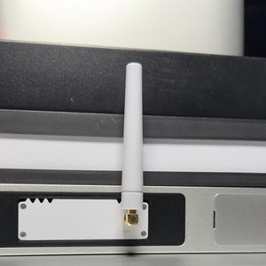 Ubiquiti SuperLink AI Key Insert 90 Degree SMA Adapter