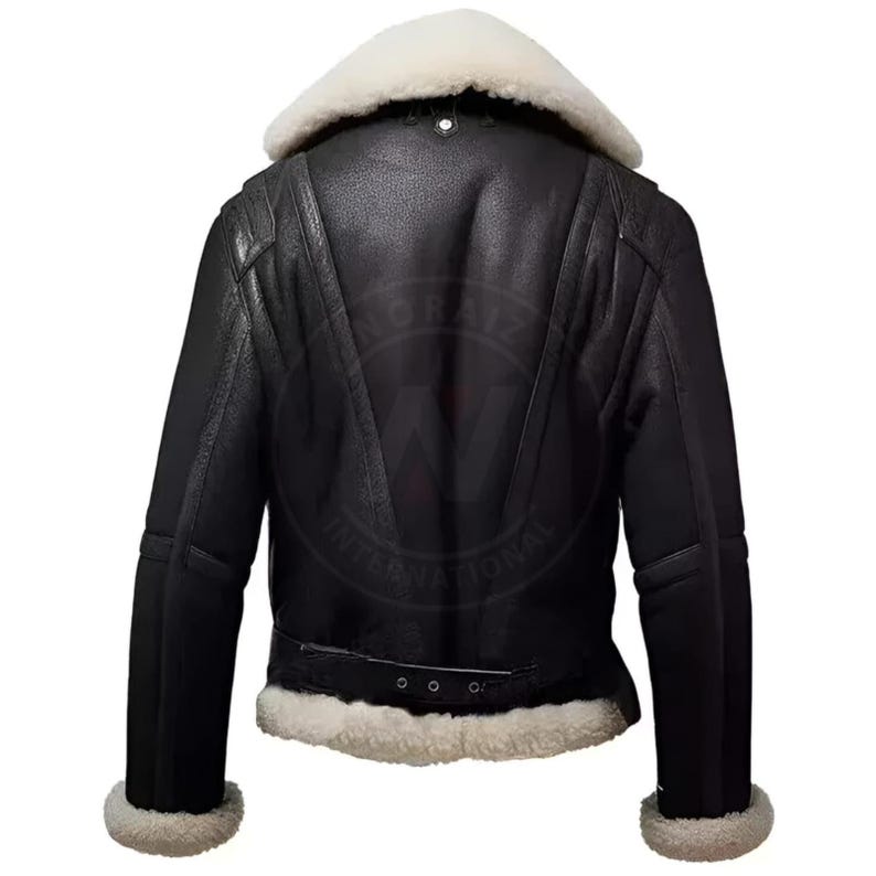 May include: Black leather jacket with a cream-colored shearling collar and trim. The jacket features a belted waist and ribbed detailing on the shoulders. The back view showcases the jacket's design and construction, highlighting its classic aviator style.