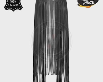 May include: Black leather skirt with long fringe detailing. The skirt features a belt with two buckles at the waist. The image includes a "Genuine 100% Leather" logo and a "Best Price" badge.