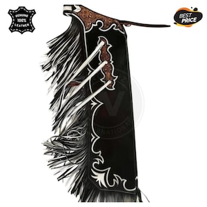 May include: Black leather chaps with white and black fringe. The chaps have decorative white stitching and brown leather accents. The image includes the text "GENUINE 100% LEATHER" and "BEST PRICE".