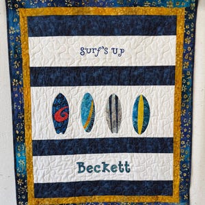 Baby Quilt with a Surfing Theme and personalized name and label