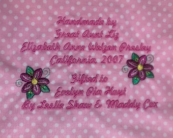 Embroidered Quilt Label with pink flower design