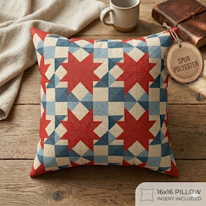 May include: A square pillow with a red, blue, and cream geometric pattern. The design features large red star shapes and smaller squares. The pillow is labeled "16x16 Pillow Insert Included" and has a tag that says "Spun Polyester".