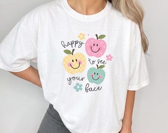 Happy to See Your Face Apple Shirt, Cute Teacher T-Shirt, Smiley Apple Graphic Tee, Back to School Teacher Shirt, Preschool Teacher Gift