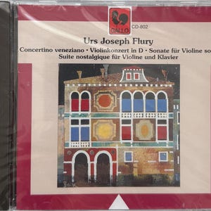 May include: A CD case with a vibrant illustration of a building with arched windows and a detailed facade. The cover includes the text "Urs Joseph Flury" and musical composition titles. The Gallo logo is in the upper right corner.