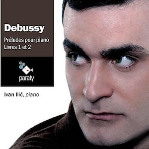 May include: Album cover featuring a portrait of a man with dark hair and intense eyes. The cover includes the text "Debussy Préludes pour piano Livres 1 et 2" and the name "Ivan Ilic, piano."