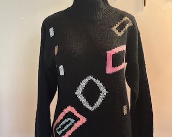 Suéter de punto negro Suzanne Kent Justine vintage de los años 80 con estampado geométrico abstracto y detalles metálicos, talla M