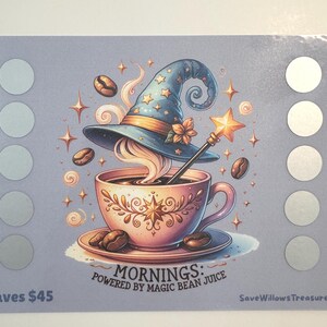 May include: A light purple gift card with a whimsical coffee-themed illustration. A blue wizard hat sits atop a coffee cup, with coffee beans and a star-shaped wand. Text reads "Mornings: Powered by Magic Bean Juice" and "Saves $45".