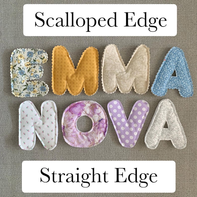 May include: Fabric letters spelling "EMMA NOVA" in various patterns and colors, including floral, polka dot, and solid hues. The letters are displayed with the text "Scalloped Edge" and "Straight Edge" above and below.