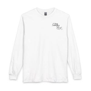 May include: White long-sleeve shirt with a crew neck. The shirt features a small graphic on the upper left chest that includes the text "NW" and "NSTRA" with a small illustration. The shirt is made of a soft material.