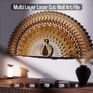 May include: Multi-layer laser-cut wall art file featuring a peacock design. The artwork is made of wood and has a fan-shaped design with intricate details. The text "Multi Layer Laser Cut Wall Art File" is at the top. File formats include DXF, SVG, PDF, CDR, and AI.