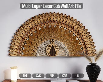 May include: A multi-layered laser-cut wall art piece in the shape of a peacock. The artwork features intricate details and a natural wood finish. The text "Multi Layer Laser Cut Wall Art File" is at the top. The artwork is displayed on a white wall.