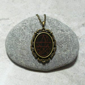Necronomicon Necklace Black And Red Antique Bronze