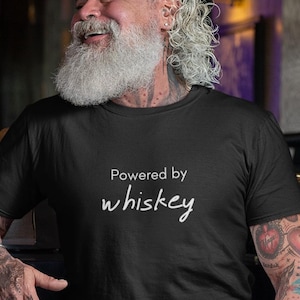 Comfort Colors, 100% Cotton Tee, Powered by Whiskey T-Shirt, Funny Drinking Shirt, Whiskey Lover Gift, Unisex Tee, Perfect for Birthdays