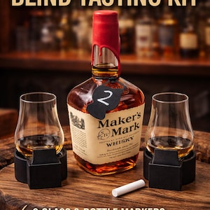 May include: A whiskey blind tasting kit with a Maker's Mark bottle, two tasting glasses, and chalk. The kit includes reusable chalk tags and glass markers. The bottle has a red wax seal. The kit is for bourbon tastings.