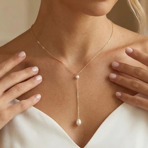 May include: A rustic wooden sign with the text "Welcome to our home" in white lettering. The sign features a distressed finish and a simple, inviting design, perfect for front door decor.