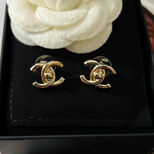Vintage Chanel Interlocking CC Gold Tone Stud Earrings