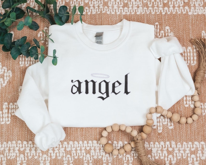 Embroidered Angel Sweatshirt for Women, Angel Crewneck, Angel on Earth Sweater, Wings Sweatshirt, Angel Wings Sweater, Women's Fashion
Embroidered
Sweatshirt
Trend
Embroidered Crewneck
Gift For Her
Cute Sweatshirt
Trendy Sweatshirt
Embroidery Design
Best Gift
Angel On Earth
Angel Sweatshirt
Sweatshirt For Women
witchy gifts