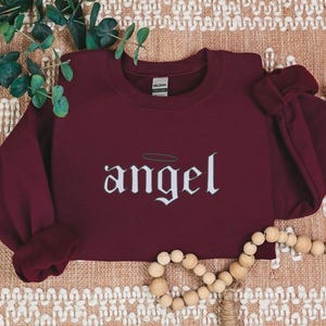 Embroidered Angel Sweatshirt for Women, Angel Crewneck, Angel on Earth Sweater, Wings Sweatshirt, Angel Wings Sweater, Women's Fashion
Embroidered
Sweatshirt
Trend
Embroidered Crewneck
Gift For Her
Cute Sweatshirt
Trendy Sweatshirt
Embroidery Design
Best Gift
Angel On Earth
Angel Sweatshirt
Sweatshirt For Women
witchy gifts