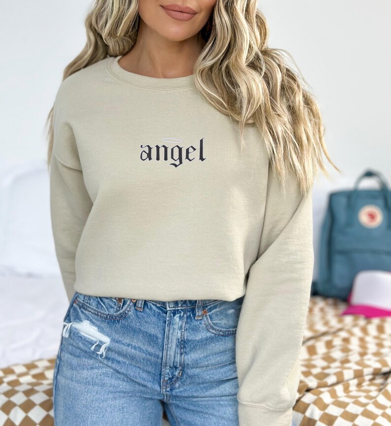 Embroidered Angel Sweatshirt for Women, Angel Crewneck, Angel on Earth Sweater, Wings Sweatshirt, Angel Wings Sweater, Women's Fashion
Embroidered
Sweatshirt
Trend
Embroidered Crewneck
Gift For Her
Cute Sweatshirt
Trendy Sweatshirt
Embroidery Design
Best Gift
Angel On Earth
Angel Sweatshirt
Sweatshirt For Women
witchy gifts