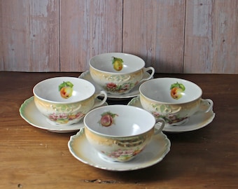 Tazas y platillos de desayuno de porcelana antigua - Juego floral del siglo XIX