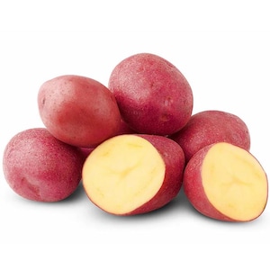 May include: A pile of fresh red potatoes, some whole and some cut in half. The potatoes have a smooth, reddish-purple skin and a creamy yellow interior. The image is well-lit, highlighting the texture and color of the potatoes.