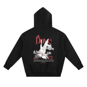 May include: Black hoodie with a white dove graphic, clouds, and the word "Dove" in red script. The back of the hoodie also features text from Luke 2:14. The hoodie has a hood and long sleeves.