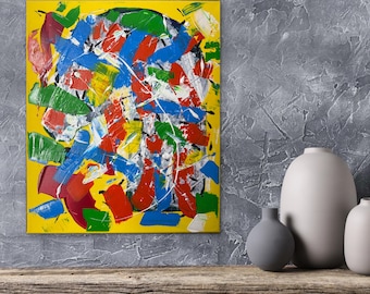 May include: Abstract art painting with a yellow background and bold strokes of blue, red, green, and white. The artwork is displayed on a gray wall, with three neutral-toned vases on a wooden shelf below.