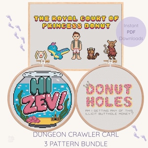 May include: A cross-stitch pattern bundle featuring three designs: a rectangular piece titled The Royal Court of Princess Donut with pixelated characters, and two circular hoops, one reading Hi Zev! in a fishbowl, and one reading Donut Holes.