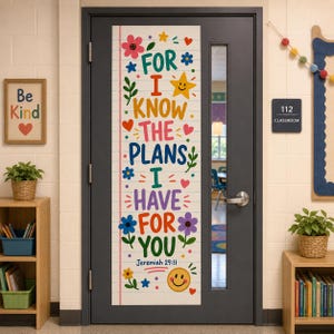 May include: A vertical door decal featuring a lined paper background with the text FOR I KNOW THE PLANS I HAVE FOR YOU Jeremiah 29:11 in colourful letters, decorated with various flowers, hearts, stars, and a yellow smiley face icon.