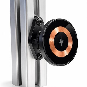 May include: A magnetic wireless charger mount featuring a circular black face with a copper-coloured coil ring and a central lightning bolt icon, attached to a vertical brushed aluminium T-slot extrusion rail with black hardware components.