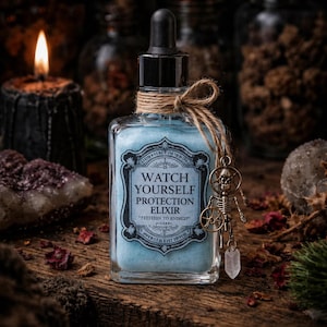 May include: A square glass bottle filled with light blue liquid, labeled "Watch Yourself Protection Elixir." The bottle is adorned with a twine bow and a skeleton charm. A lit candle and crystals are in the background, creating a mystical theme.