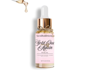 May include: A clear glass bottle of ritual oil with a gold cap and dropper. The label is pink with the text "Sold Out Again" and "Ritual Oil." The bottle contains 1 fl oz / 30 ml of liquid. A dropper dispenses the oil.