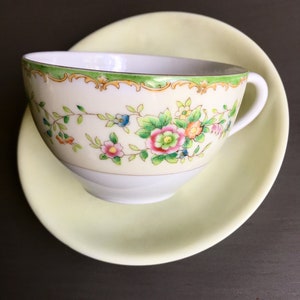 Mismatched Yellow Floral Tea Cup and Saucer