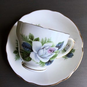 Bone China Tea Cup and Saucer with Blue Roses and Gold Trim