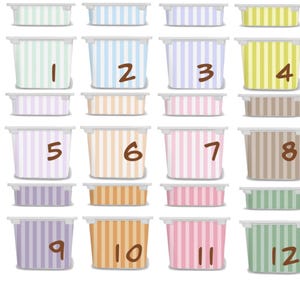 May include: A grid of twelve rectangular plastic storage containers with lids, each featuring vertical stripes in various pastel colors including mint, blue, lavender, yellow, peach, pink, and tan, labeled with brown numbers one through twelve.