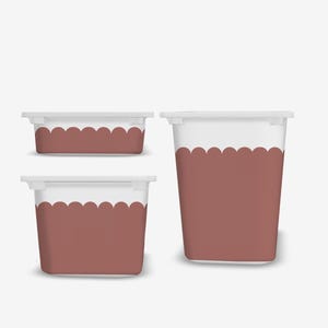 May include: Three white and brown storage containers with scalloped edges. The containers are rectangular and cylindrical, with lids. The brown color is a muted, earthy tone. The containers are designed for organizing and storage.
