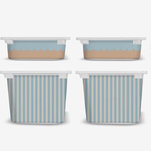 May include: Four rectangular storage containers with white lids. Two containers have a blue and tan wave design, and the other two have blue and white vertical stripes. The containers are made of a durable material.