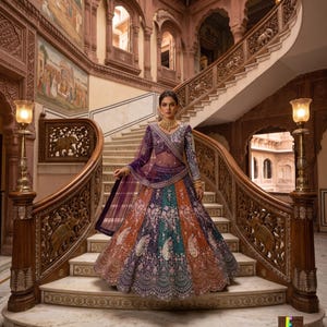 May include: A multi-colored lehenga choli featuring a deep purple blouse and a voluminous skirt with alternating panels of orange, teal, and purple, all heavily embellished with intricate floral embroidery, paisley motifs, and a sheer purple dupatta.