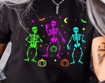 Esqueletos bailando neón de Halloween (PNG), esqueleto SVG, clipart de esqueleto retro, diseño DXF de temporada espeluznante, sublimación de Halloween, camiseta de Halloween