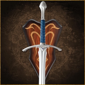 May include: A silver sword with a blue handle and a wooden shield with a map design. The sword has a detailed hilt and a sharp blade. The shield is brown with gold accents.
