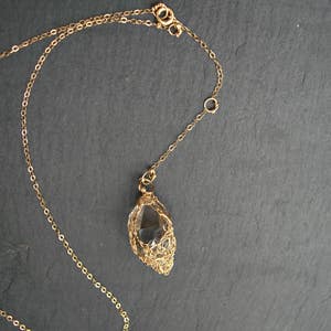 Talisman pendant - Herkimer diamond in the nest of gold