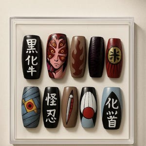 May include: A collection of ten painted wooden objects, each with a unique design. The designs include flames, faces, and Japanese characters. The objects are displayed in a white frame.